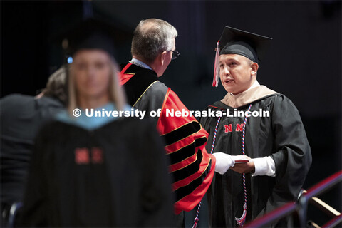 Diego Sanchez receives his MBA from Chancellor Ronnie Green. Summer Graduate Commencement at Pinnacl