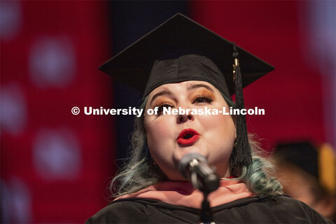 Elaina Matthews, a 2020 Master of Music graduate, sings the National Anthem at the Undergraduate Com