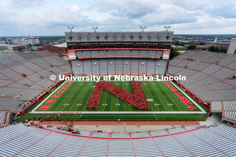 Part of the Big Red Welcome is the formation of an N on the field in Memorial Stadium made up of the