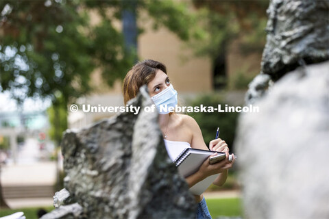 Dehray Eleutice and the rest of the Architecture 210 class were sketching sculptures outside of Arch