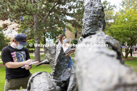 Dehray Eleutice and the rest of the Architecture 210 class were sketching sculptures outside of Arch