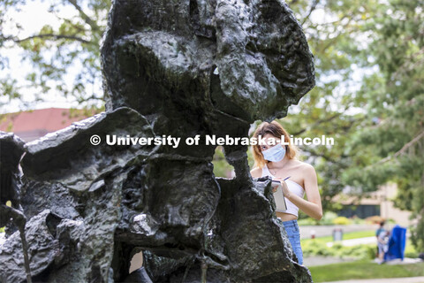 Dehray Eleutice and the rest of the Architecture 210 class were sketching sculptures outside of Arch