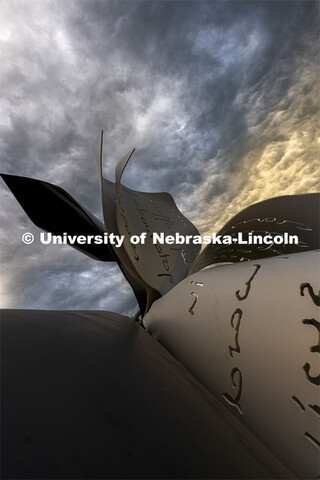 Early morning clouds behind the Torn Notebook sculpture on city campus. September 17, 2021. 