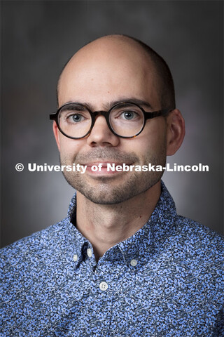 Studio portrait of Alex Claussen, French Graduate Teaching Assistant (GTA), Modern Languages and Lit