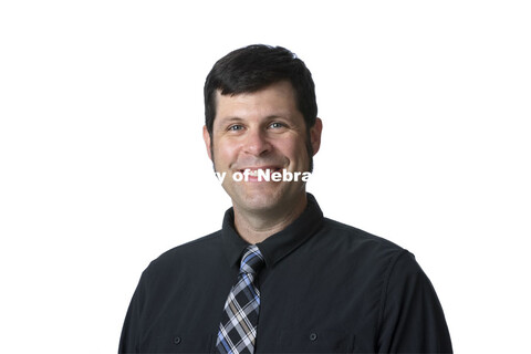 Studio portrait of Adam Wagler, Associate Dean of Academic Programs and Associate Professor of Adver