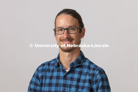 Studio portrait of Drew Davis, Digital Instructional Specialist, School of Art, Art History and Desi