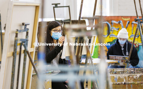 Nancy Nguyen, senior from Lincoln, works on a sketch in Aaron Holz’ Intermediate Painting class in