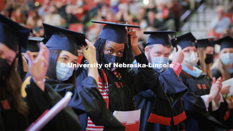 Jasmine Alexander moves her tassel as the end of the Graduate Commencement at Pinnacle Bank Arena. D