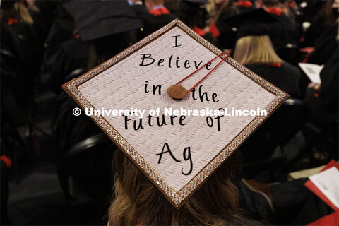 Decorated mortarboards at the Undergraduate Commencement at Pinnacle Bank Arena. December 18, 2021. 