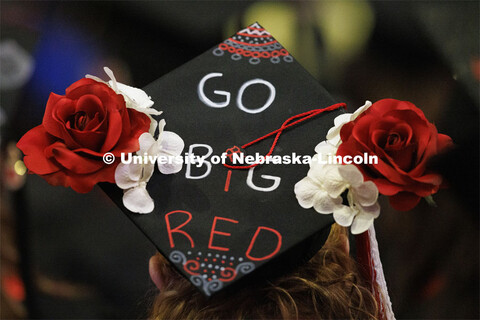 Decorated mortarboards at the Undergraduate Commencement at Pinnacle Bank Arena. December 18, 2021. 