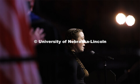 Hannah Healy sings the National Anthem for the Undergraduate Commencement at Pinnacle Bank Arena. De