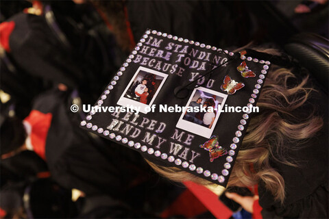 Decorated mortarboards at the Undergraduate Commencement at Pinnacle Bank Arena. December 18, 2021. 