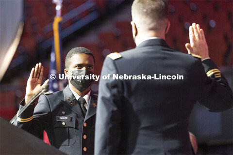 Hunter Parker takes oath of office as he was commissioned as a second lieutenant in the U. S. Army f