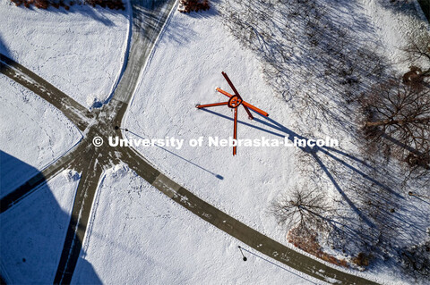 Aerial view of the five sidewalks that come together near the Old Glory Sculpture. Winter snow scene