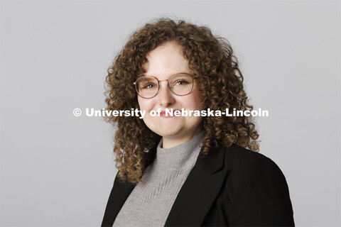 Studio portrait of Mia Virgillito, Copywriter, Academic Services and Enrollment Management. ASEM por