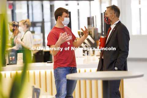 Chancellor Ronnie Green talks with Benjamin Janssen, a junior from Marquette, Nebraska, at the Nebra