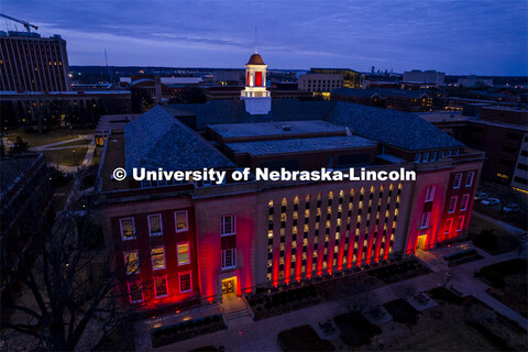 The Love Library and cupola are lit up with red lights for Glow Big Red. February 16, 2022. 