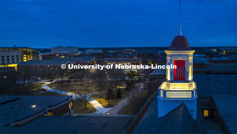 The Love Library and cupola are lit up with red lights for Glow Big Red. February 16, 2022. 