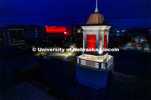 The Love Library and cupola are lit up with red lights for Glow Big Red. February 16, 2022. 