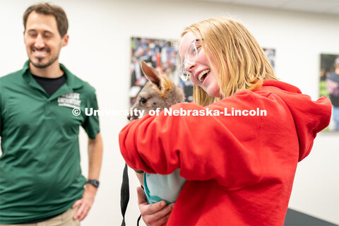 Students pet animals during the End of Year Bash inside the East Campus Union on Saturday, April 30,