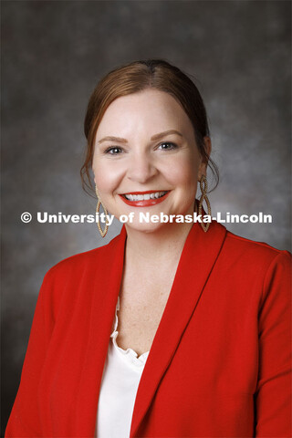 Studio portrait of Ashley Benes, Associate Extension Educator, 4-H Youth Development Coordinator. Po