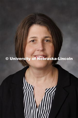 Studio portrait of Amy Topp, Engagement Zone Coordinator, Extension Educator. Portraits of Extension