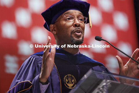 Marco Barker, Vice Chancellor for Diversity and Inclusion, delivers the commencement address. Gradua