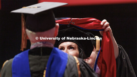 Hooding at graduate commencement in Pinnacle Bank Arena. May 13, 2022. 