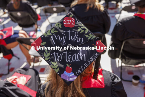 Kayla Hlavacek’s decorated mortar board. UNL undergraduate commencement in Memorial Stadium. May 1