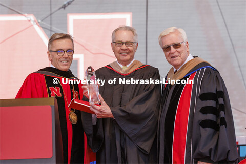 Terry Fairfield, center, along with UNL Chancellor Ronnie Green, left, and NU Regent Bob Phares. Fai