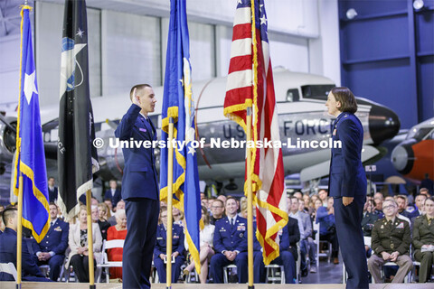 Second Lt. Lucas Heaton recites the Oath of Office as directed by Air Force Major Nicole Beebe on Ma