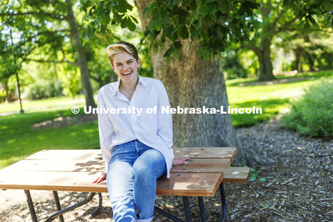 Ally Barry, a junior in environmental studies, sits in the arboretum on East Campus, one of her favo