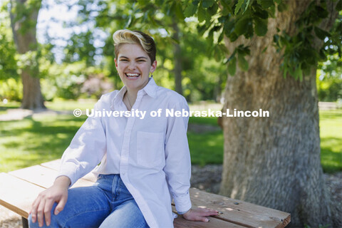 Ally Barry, a junior in environmental studies, sits in the arboretum on East Campus, one of her favo