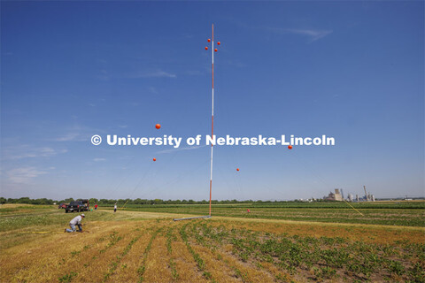 A tower goes up at the UNL 84th and Havelock fields for Benjamin Riggan, assistant professor of elec