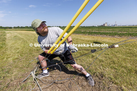 A tower goes up at the UNL 84th and Havelock fields for Benjamin Riggan, assistant professor of elec