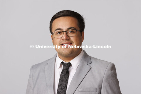 Studio portrait of Edgar Estrada, ASEM Admissions Counselor. August 31, 2022. 