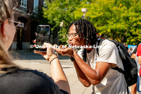 Cameron Cannon, a sophomore from Atlanta, gets up close to a tarantula at the Petting Zoo with Wildl