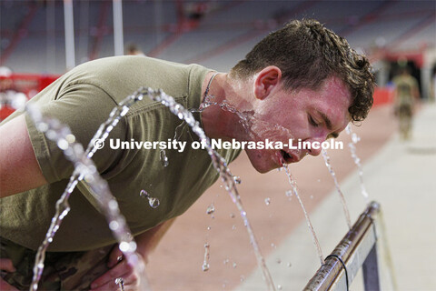 Army ROTC cadet Markus Case gets a drink following the stair climb. More than 160 UNL ROTC cadets al