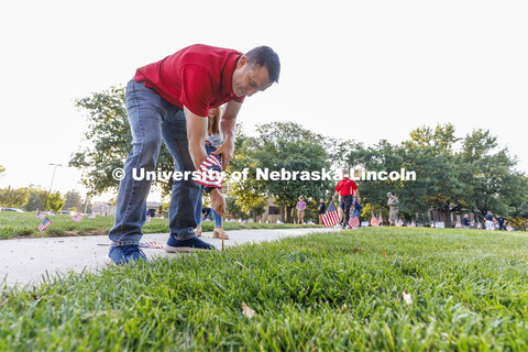 The Nebraska Military and Veteran Success Center, ASUN and others placed flags and signs on East Cam