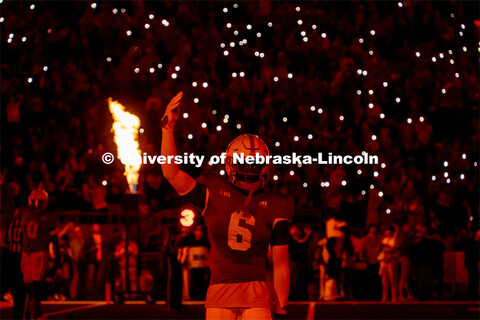 Nebraska football players work to defeat Georgia Southern. Nebraska vs. Georgia Southern football in