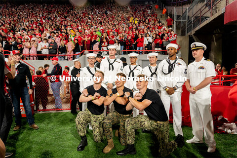 ROTC Army cadets pose with Navey. Nebraska vs. Georgia Southern football in Memorial Stadium. Septem