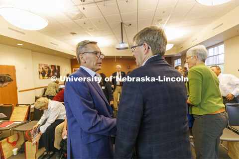 Chancellor Ronnie Green and Mike Boyle, president of local operations for Kawasaki, talk after the c