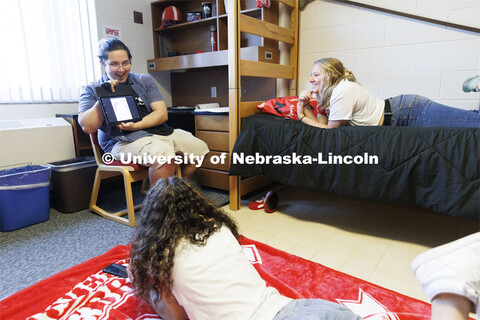 Students socializing in their dorm rooms. Housing Photo Shoot in Able Sandoz Residence Hall. Septemb