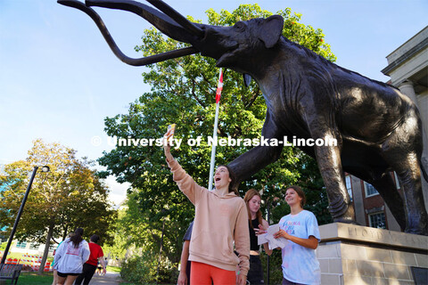 Members of Gamma Phi Beta take a selfie in front of Archie on at the Homecoming Traditions Race. The