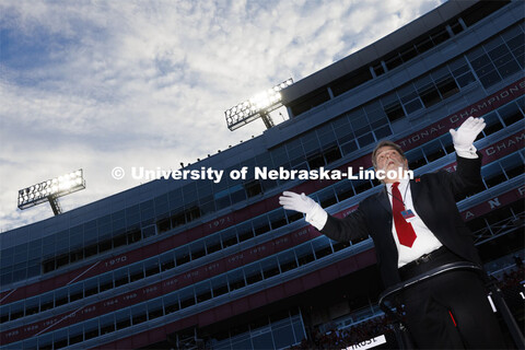 Anthony Falcone directs the Cornhusker Marching Band. Nebraska vs. Indiana football Homecoming game.