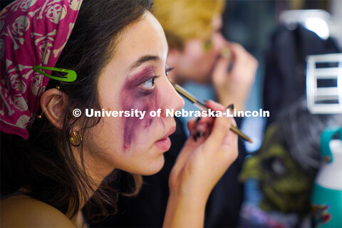 Aurora Villarreal applies stage makeup before the Shakesfear Haunted house on October 12. As a longt