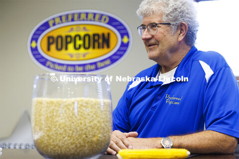 Interviewed in his company office’s conference room, Norm Krug co-founded Preferred Popcorn, wonde