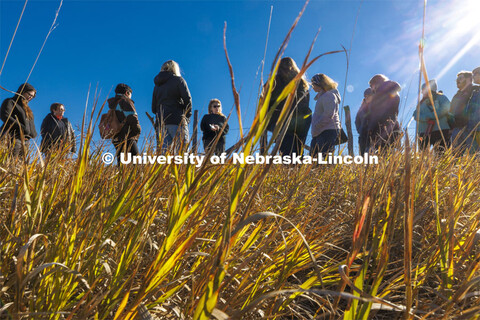 Sophia Perdikaris talks with academic counselors on a tour of Reller Prairie in southwest Lancaster 