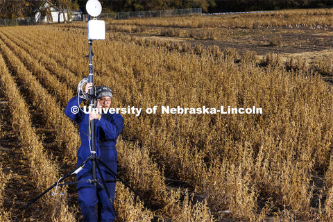 Graduate students Sang Won Shin carries a millimeter-wave (mmWave) radio with phased-array antenna o