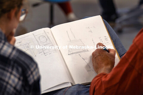 Iowa State professor Chris Martin goes over a sketch idea with a student. Architecture design profes